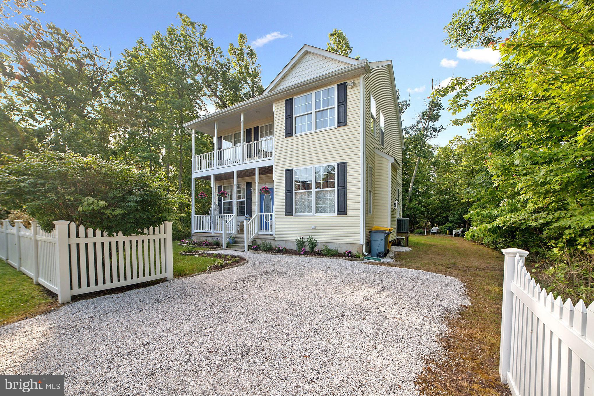 1703 Bay Road Shady Side, MD 20764 - Photo 3 of 27 Fenced front yard and relaxing front porch