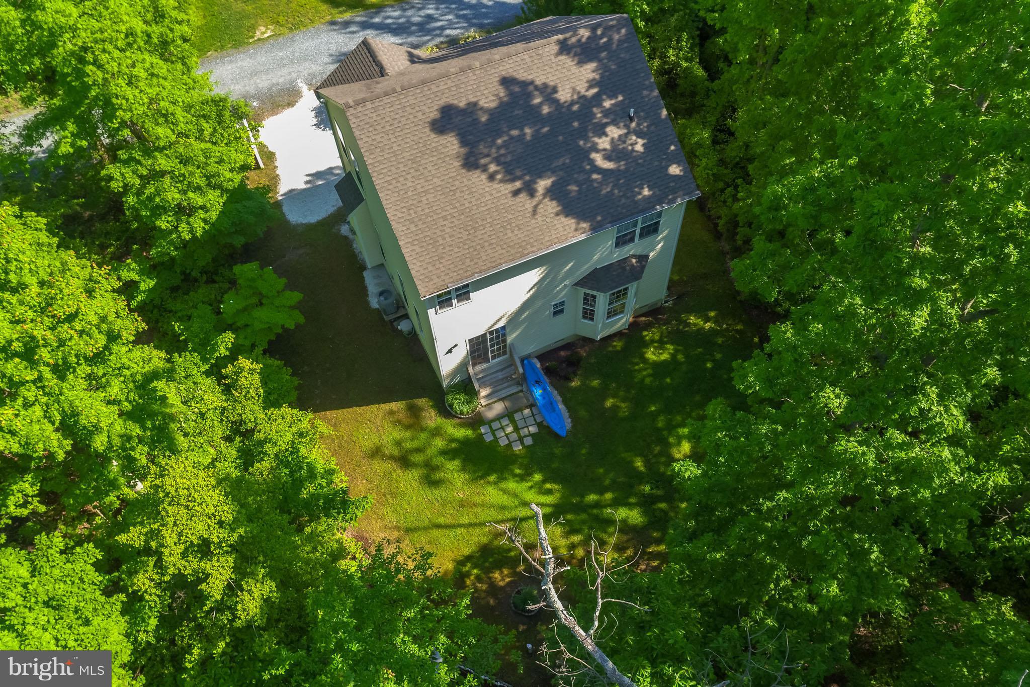 1703 Bay Road Shady Side, MD 20764 - Photo 25 of 27 Lovely backyard with room for kayak storage