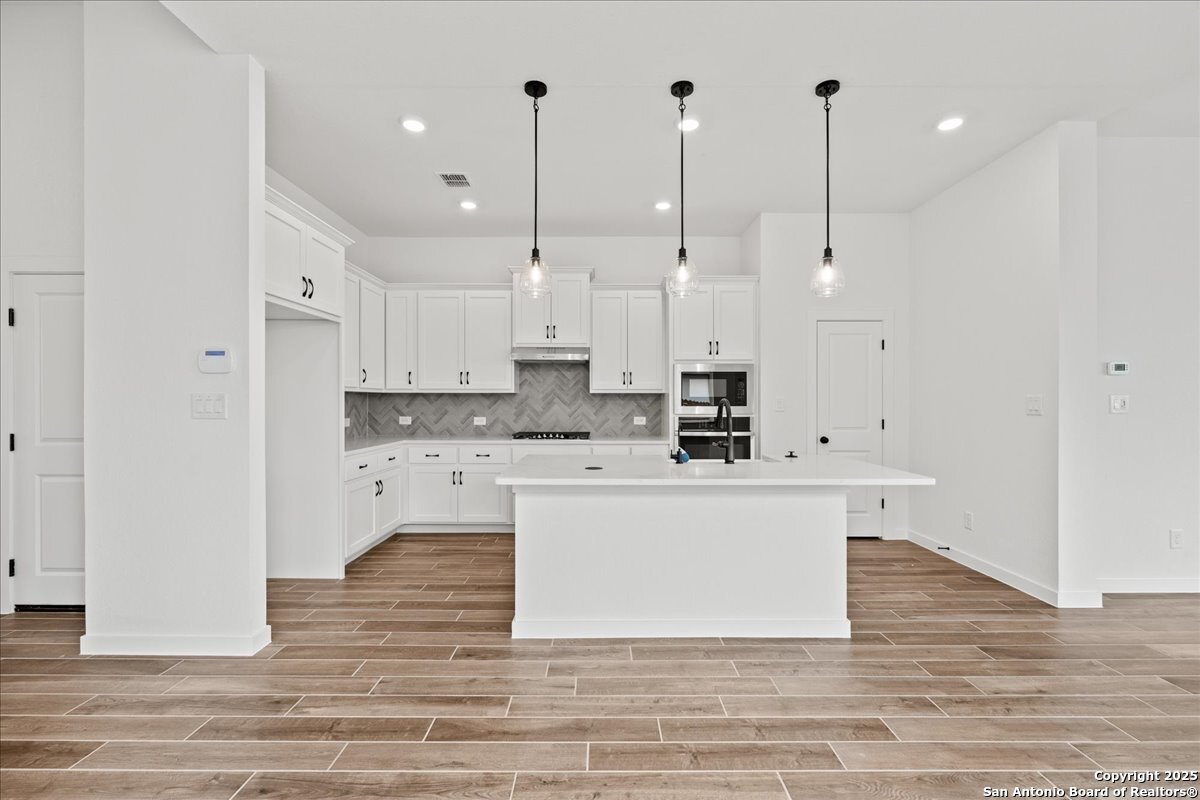 2013 Shepards Street Seguin, TX 78155 - Photo 4 of 21 a view of kitchen with stainless steel appliances granite countertop cabinets