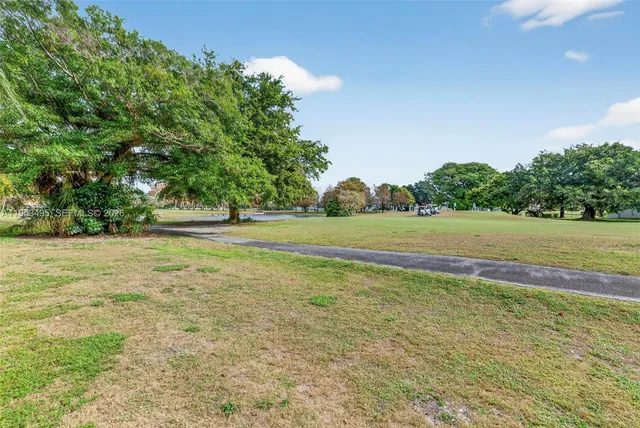 $365,000 | 6744 North Pine Island Road, Tamarac, FL 33321