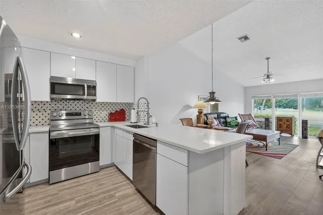 $365,000 | 6744 North Pine Island Road, Tamarac, FL 33321