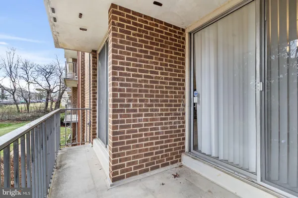 a kitchen with stainless steel appliances granite countertop a stove a sink a refrigerator and a cabinets