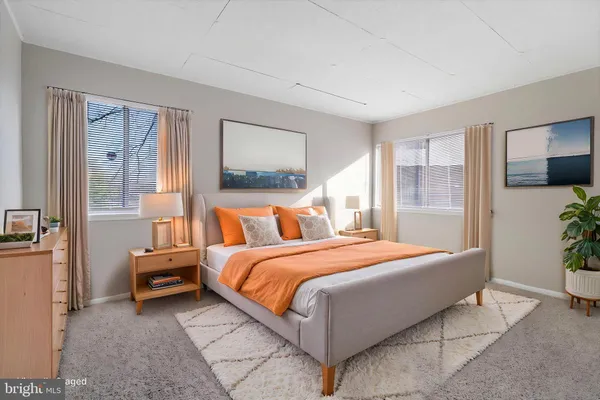 a view of an empty room with closet area