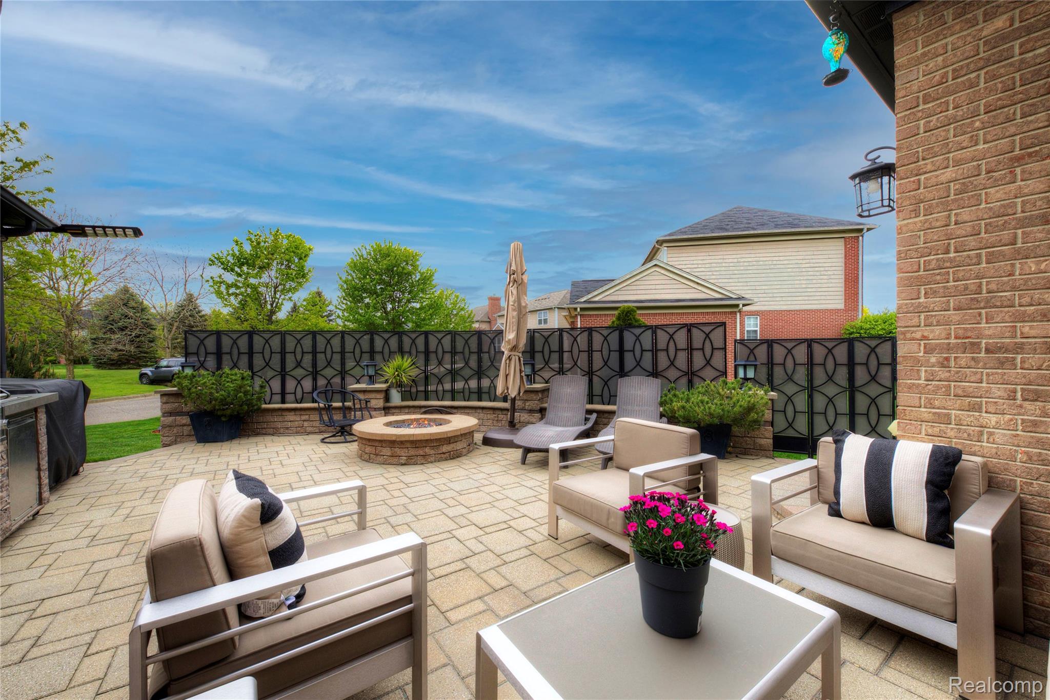50411 Lansdowne Road Canton, MI 48188 - Photo 57 of 75 View of patio featuring an outdoor living space with a fire pit