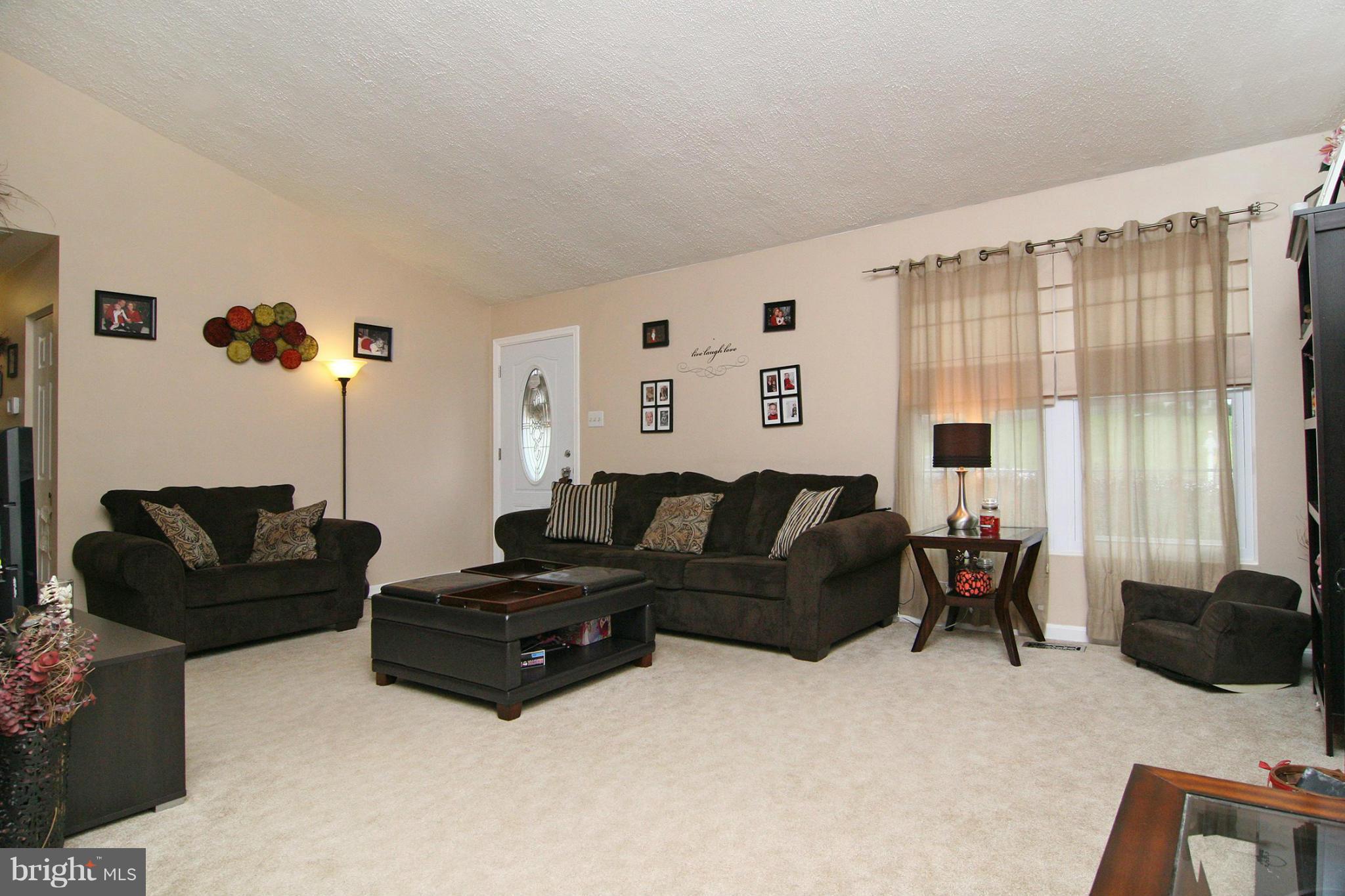 3200 Atlee Ridge Road New Windsor, MD 21776 - Photo 2 of 19 a living room with furniture and large windows