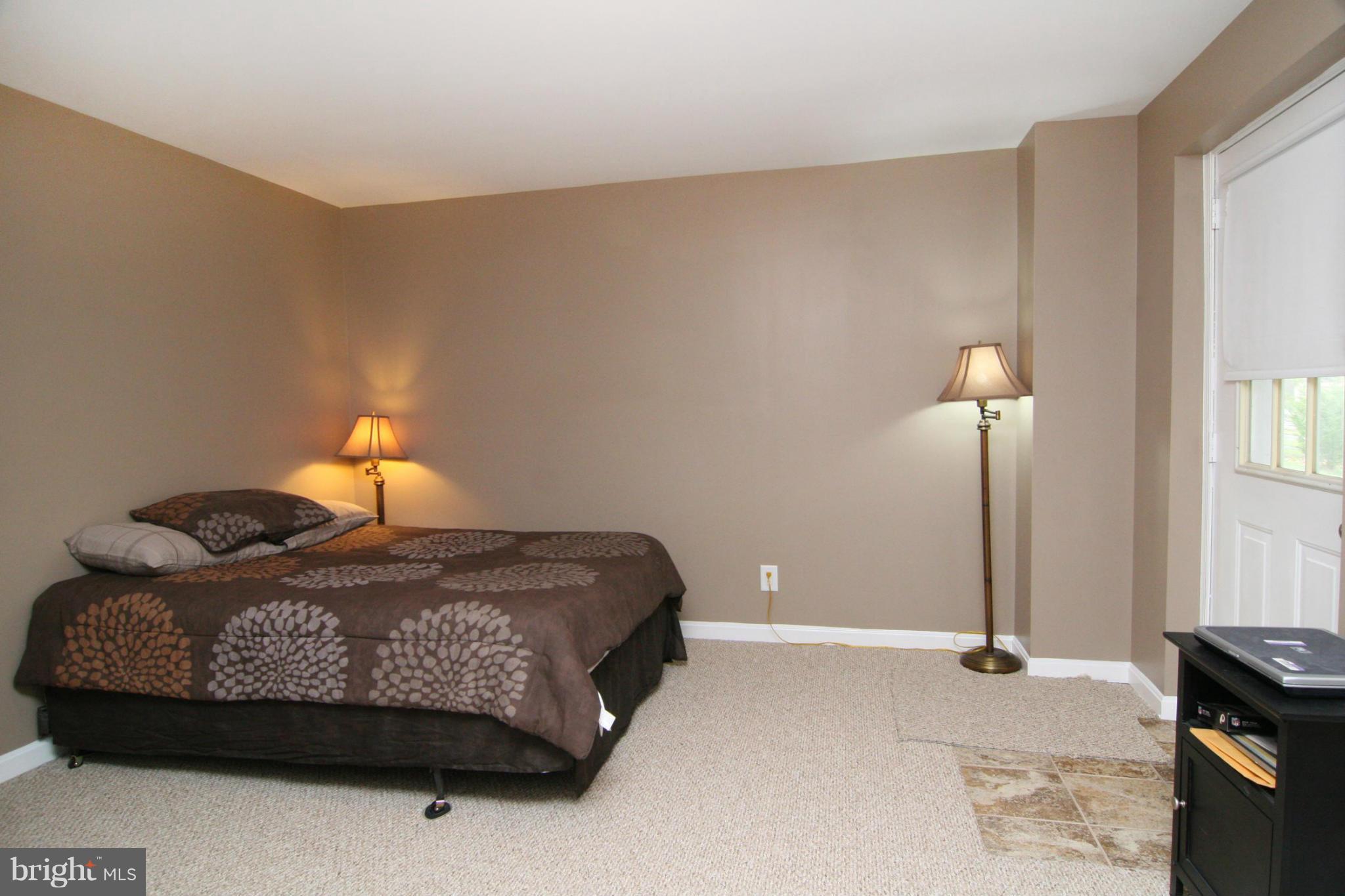 3200 Atlee Ridge Road New Windsor, MD 21776 - Photo 13 of 19 a bedroom with a bed and a window