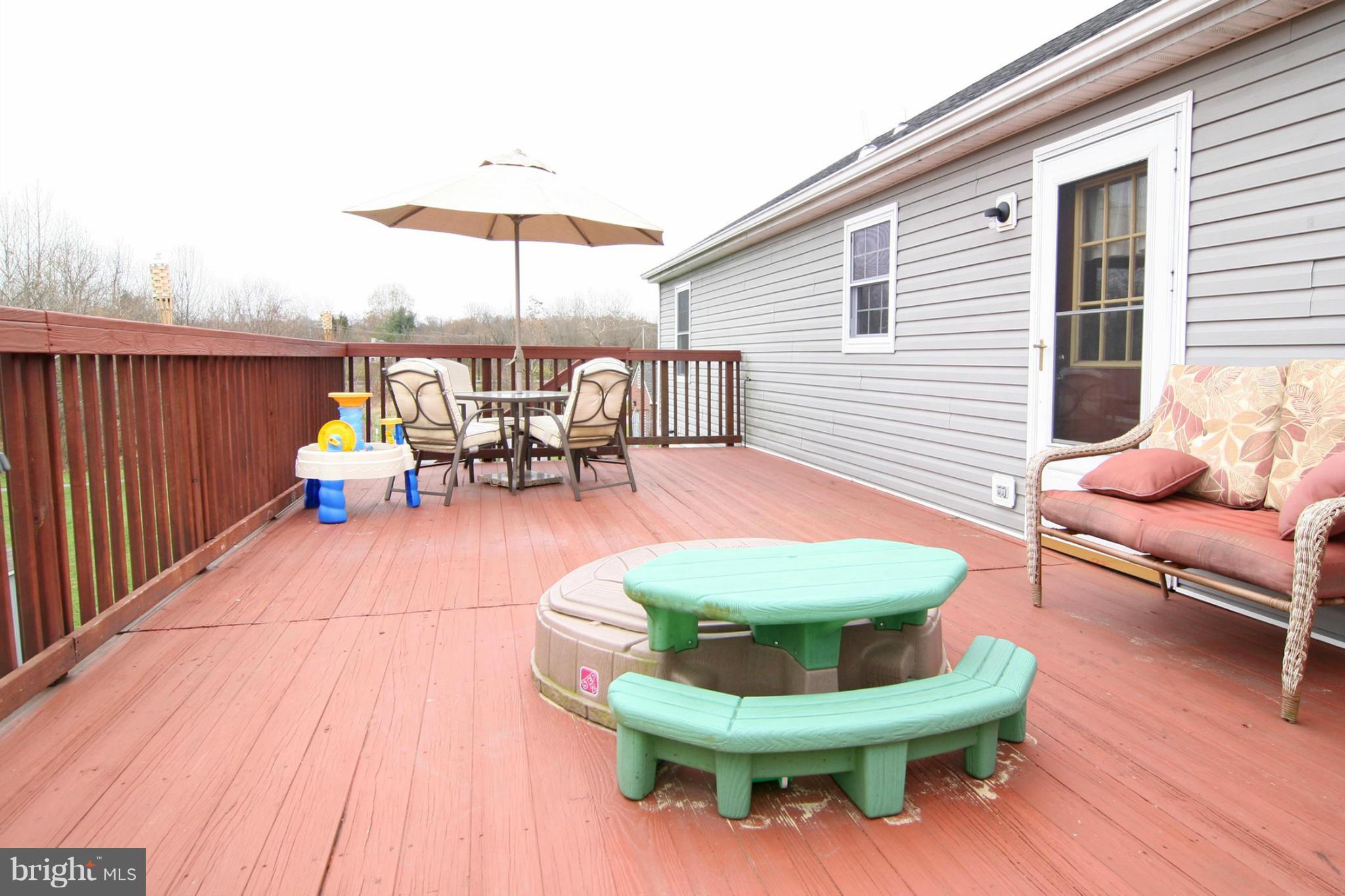 3200 Atlee Ridge Road New Windsor, MD 21776 - Photo 15 of 19 a view of a patio with couple of chairs and a potted plant