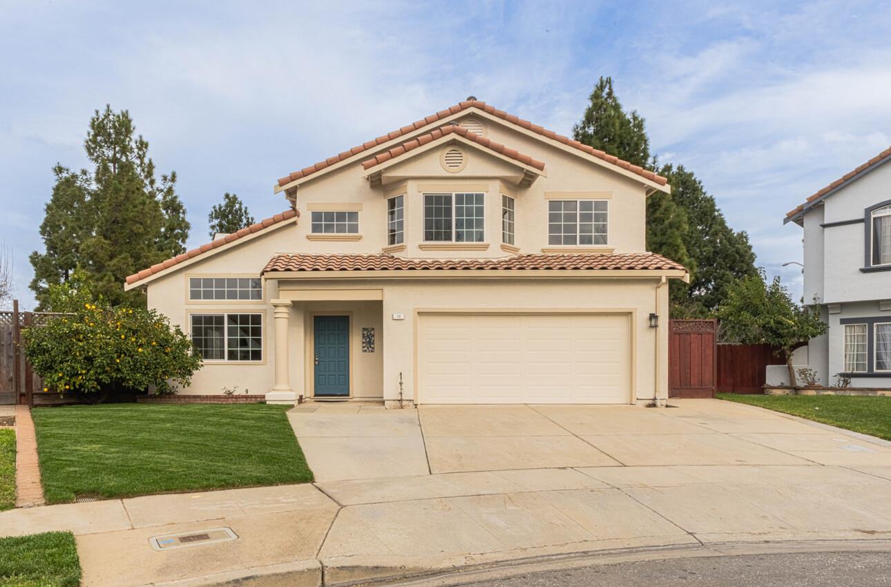 10 Rex Circle Salinas, CA 93906 - Photo 1 of 43 a front view of a house with a yard and garage