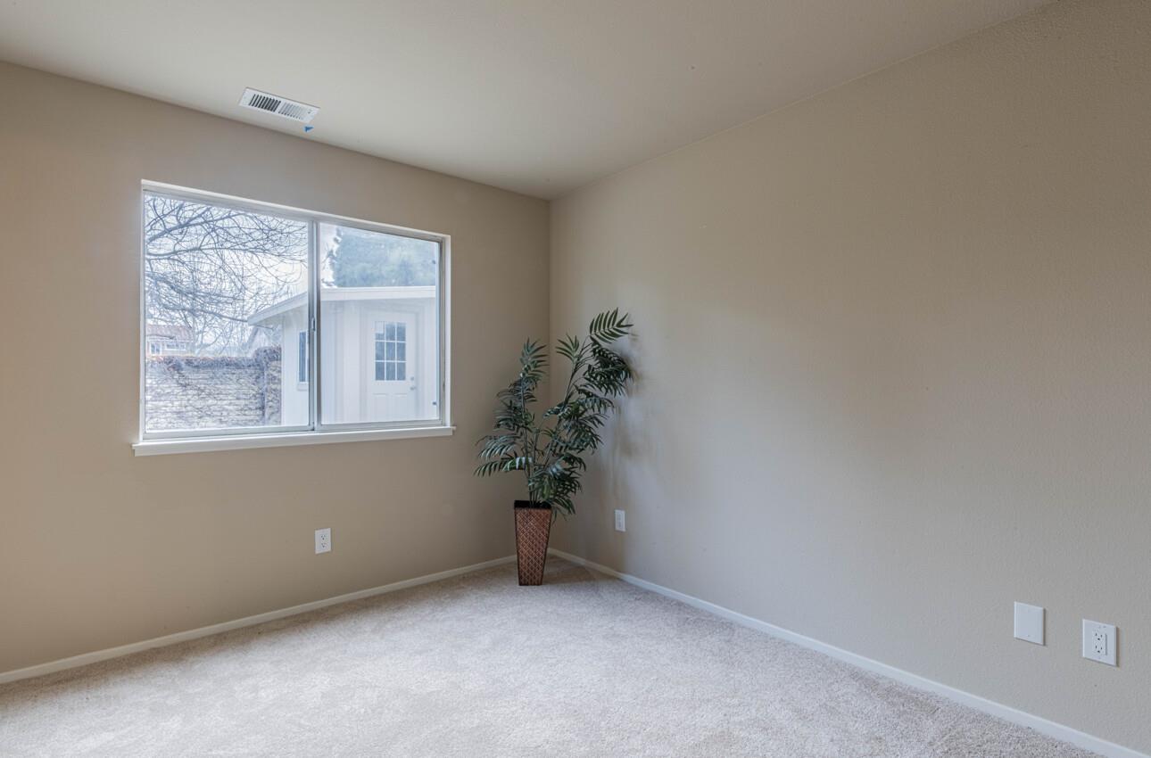 10 Rex Circle Salinas, CA 93906 - Photo 16 of 43 an empty room with window and a potted plant