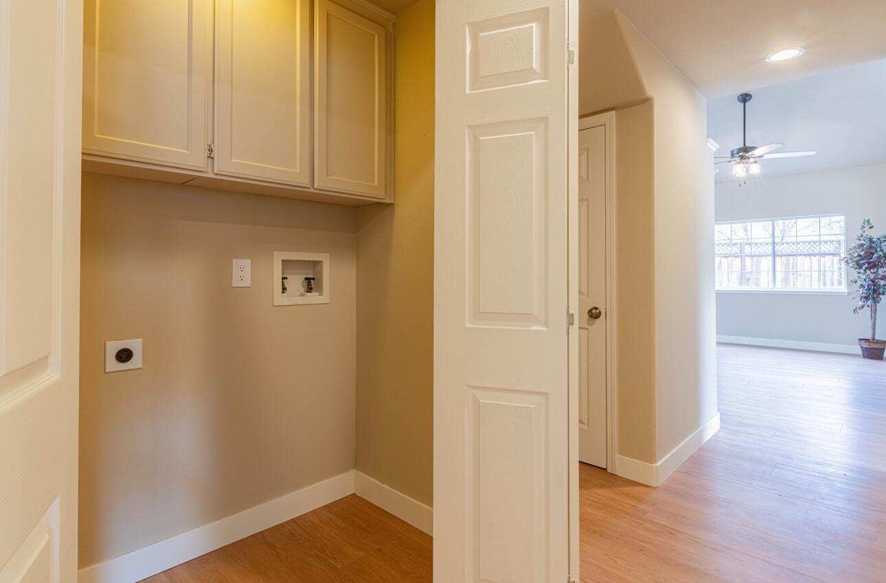 10 Rex Circle Salinas, CA 93906 - Photo 19 of 43 a view of an empty room with wooden floor and a bathroom