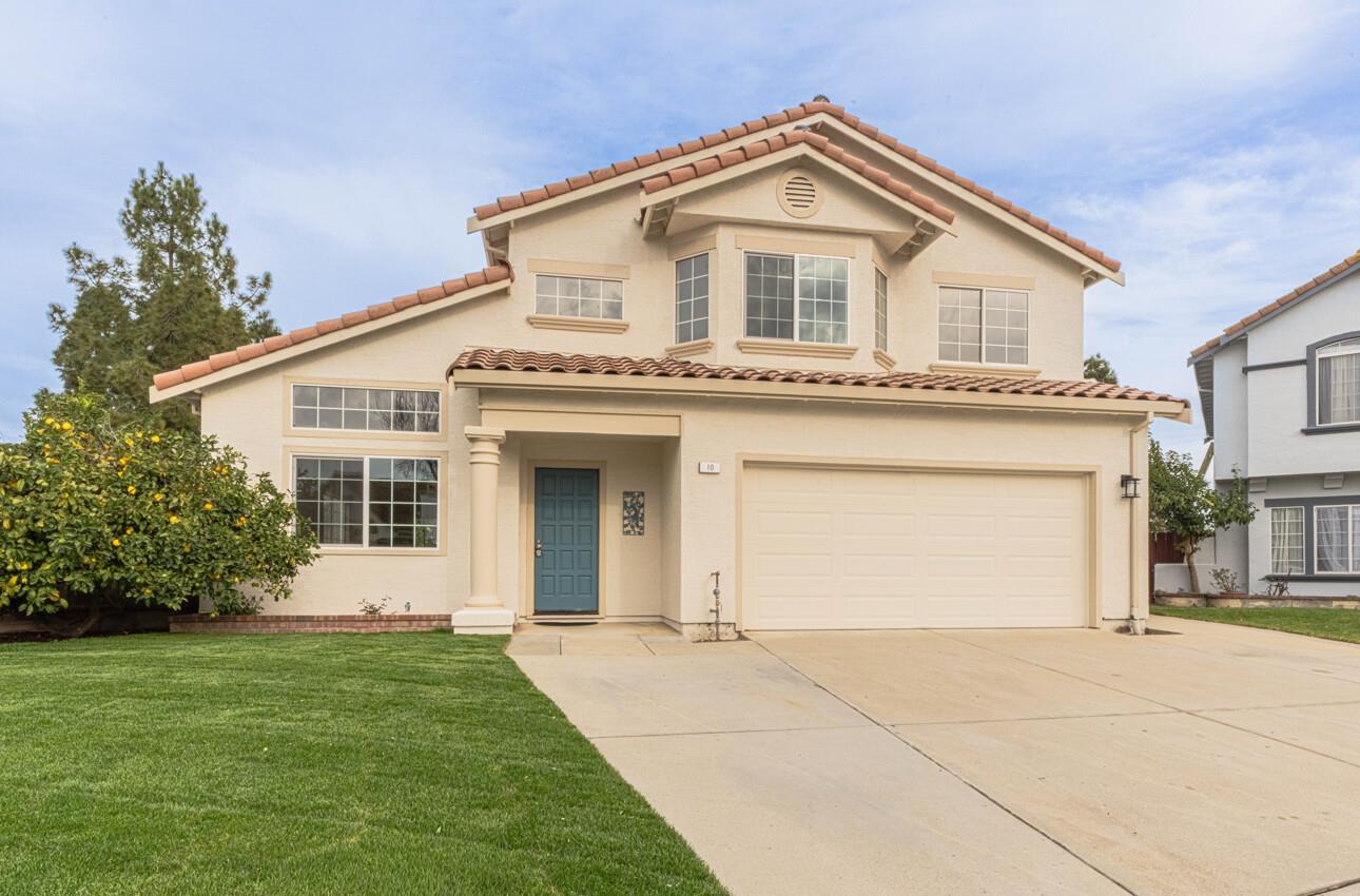 10 Rex Circle Salinas, CA 93906 - Photo 2 of 43 a front view of a house with a garden and yard