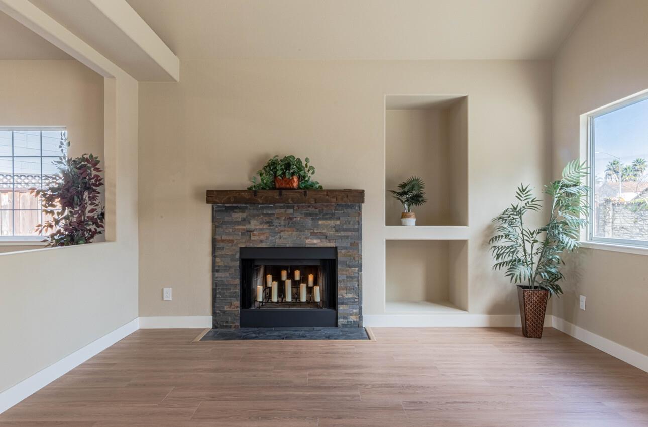 10 Rex Circle Salinas, CA 93906 - Photo 8 of 43 a living room with furniture and a fireplace
