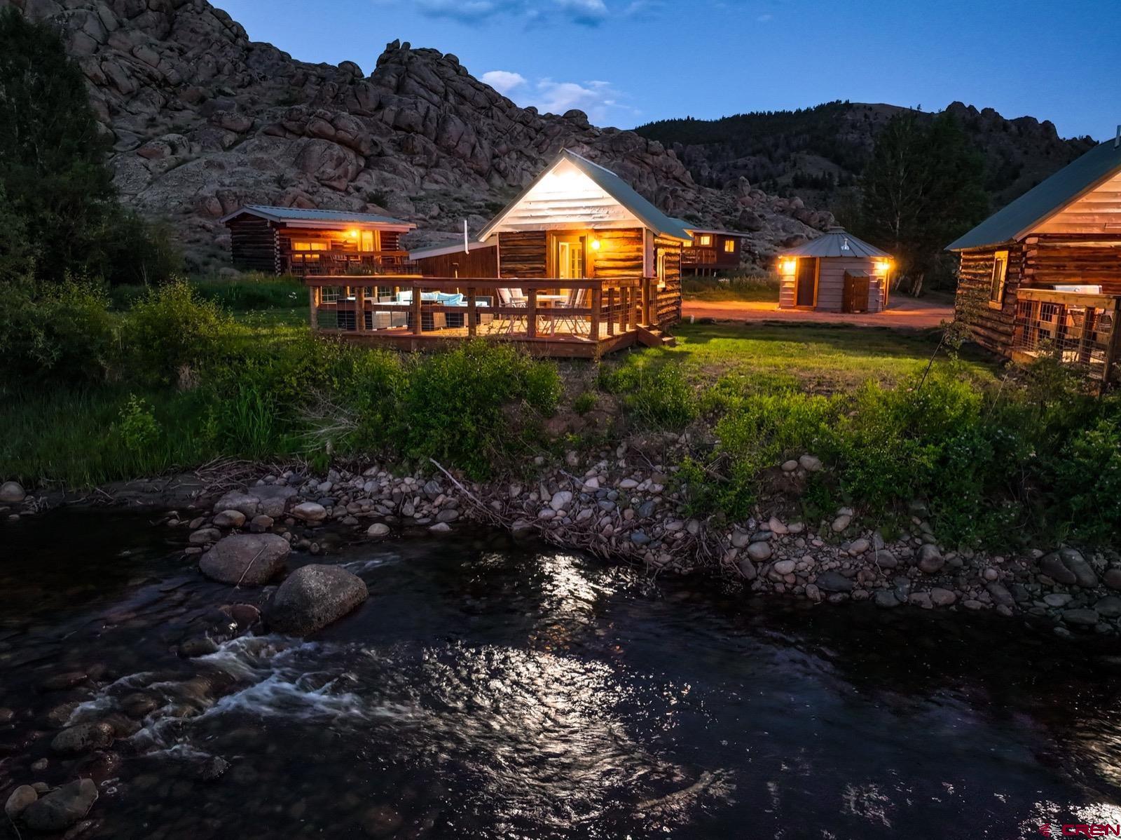 5291 County Road 76 Parlin, CO 81239 - Photo 12 of 45 a view of a big yard and a large tree
