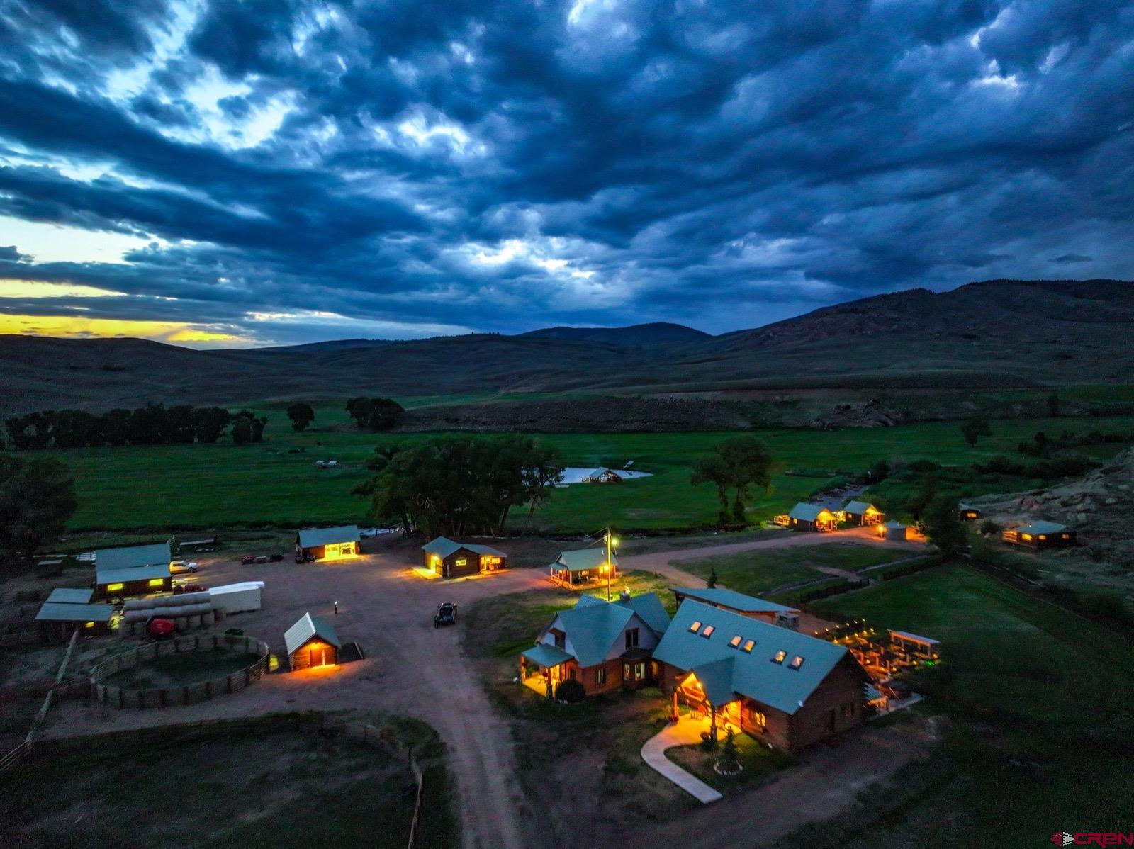 5291 County Road 76 Parlin, CO 81239 - Photo 2 of 45 a view of a table and chairs in patio