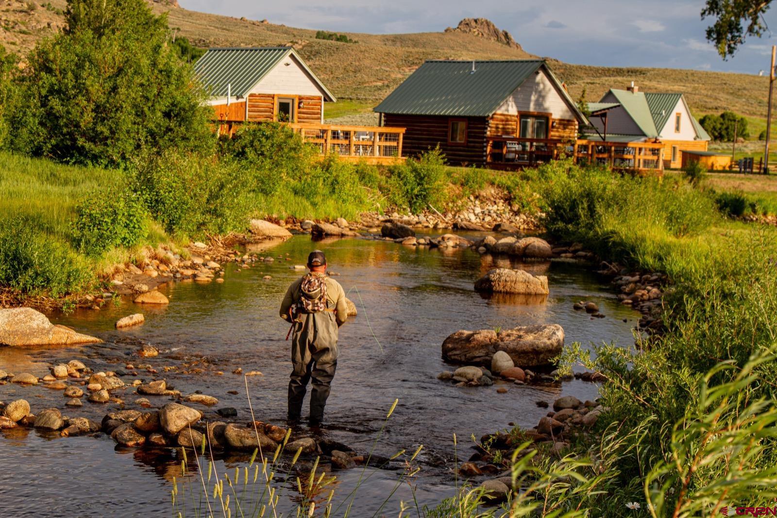 5291 County Road 76 Parlin, CO 81239 - Photo 27 of 45 a view of multiple houses with a yard