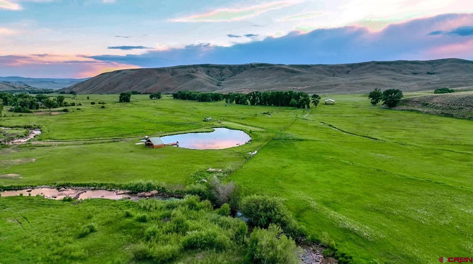 5291 County Road 76 Parlin, CO 81239 - Photo 31 of 42 a view of a lush green hillside and houses