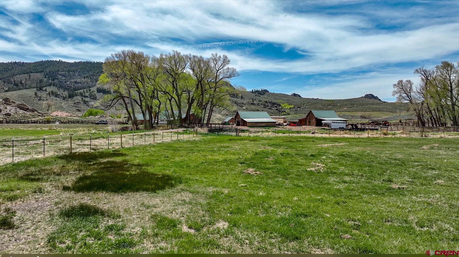 5291 County Road 76 Parlin, CO 81239 - Photo 34 of 42 a view of a yard with an outdoor space