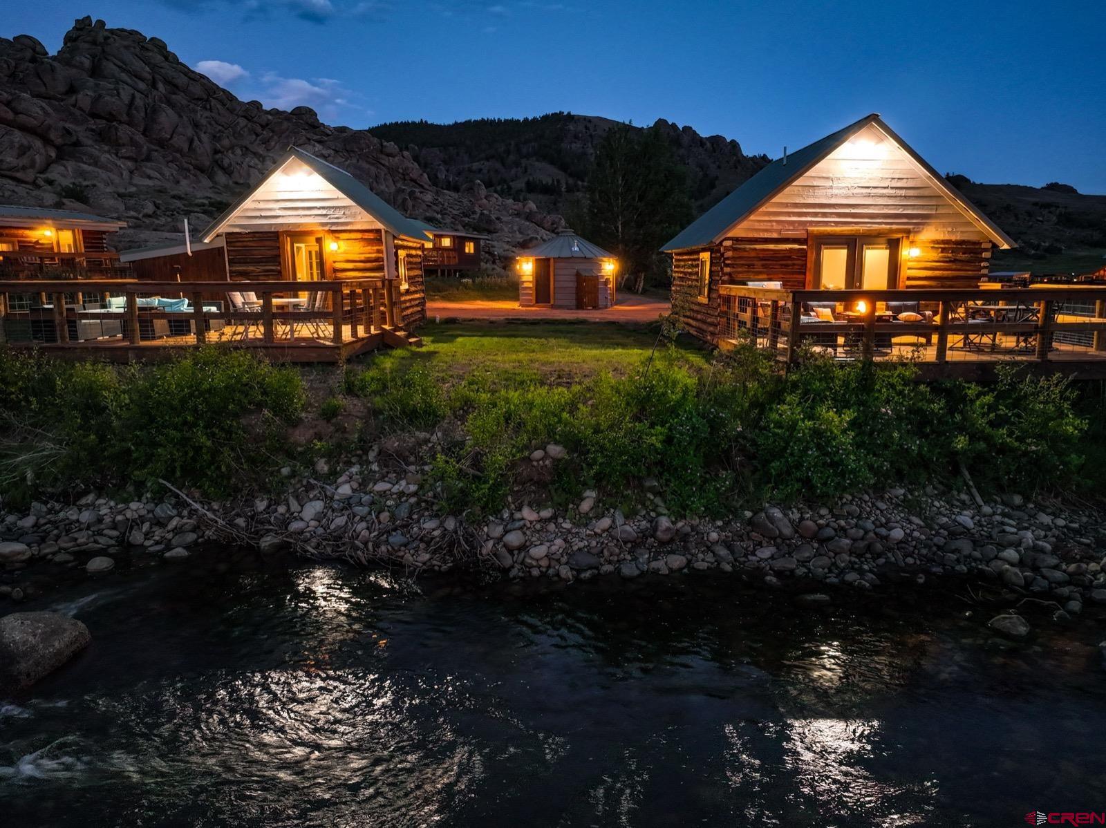 5291 County Road 76 Parlin, CO 81239 - Photo 34 of 45 a front view of a house with a yard