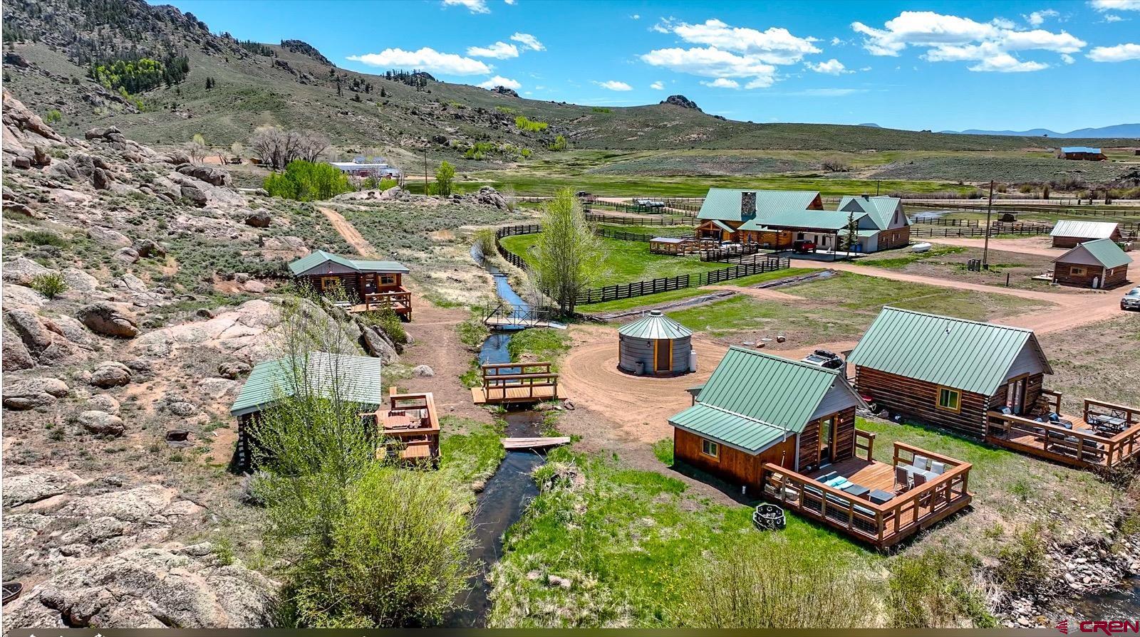 5291 County Road 76 Parlin, CO 81239 - Photo 6 of 45 an aerial view of a house with outdoor space