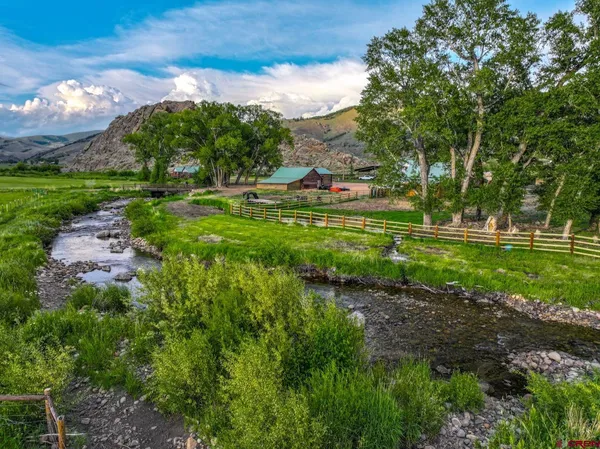 a view of a house with garden