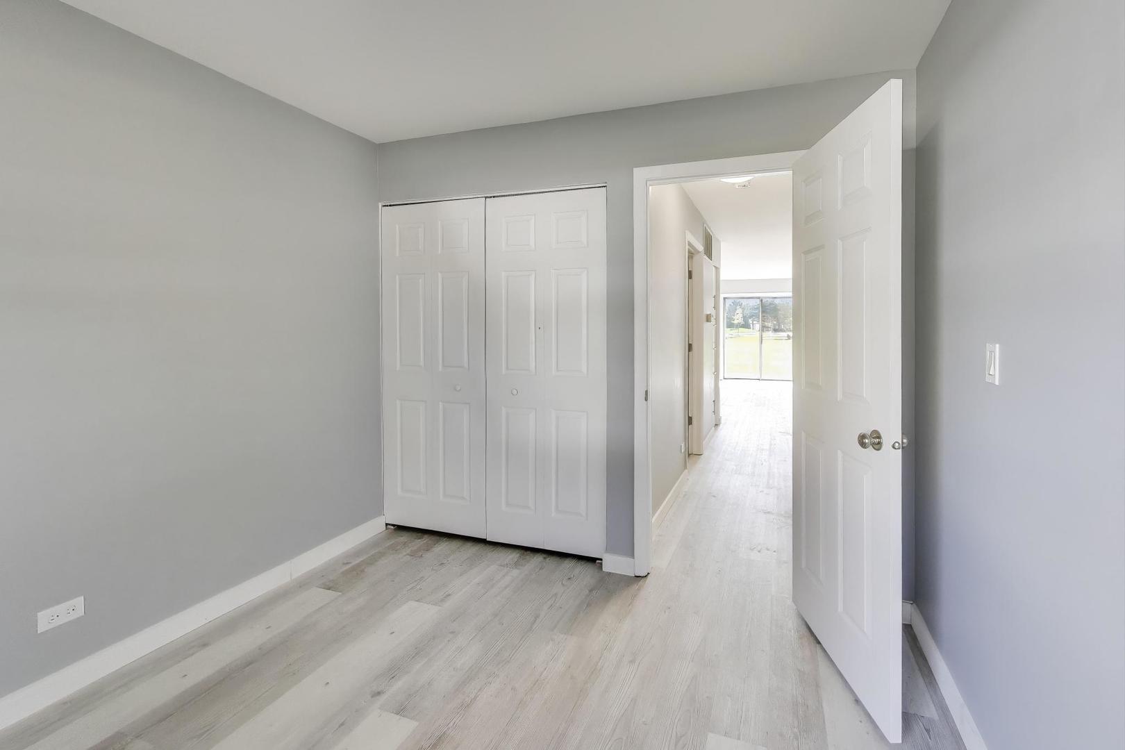 609 Hanover Court, Unit X1 Schaumburg, IL 60194 - Photo 14 of 25 a view of hallway with closet area