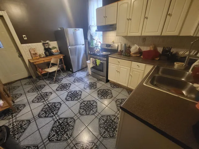 a view of a hallway with staircase