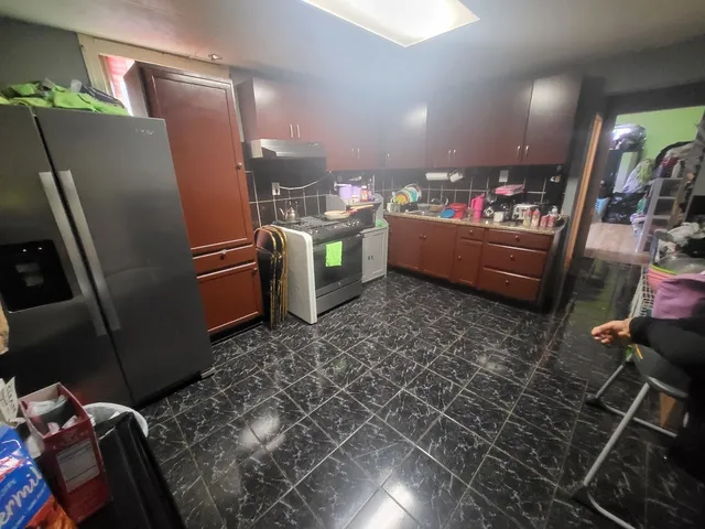 a bed room with a bed and a mirror