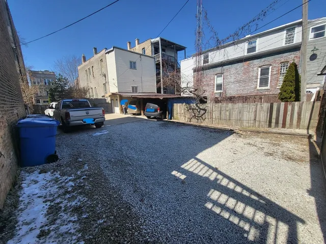 a view of a back yard of the house