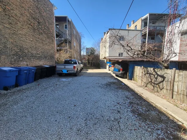 a view of street with large buildings