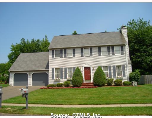 41 Foxcroft Road Enfield, CT 06082 - Photo 1 of 1 a front view of a house with a yard