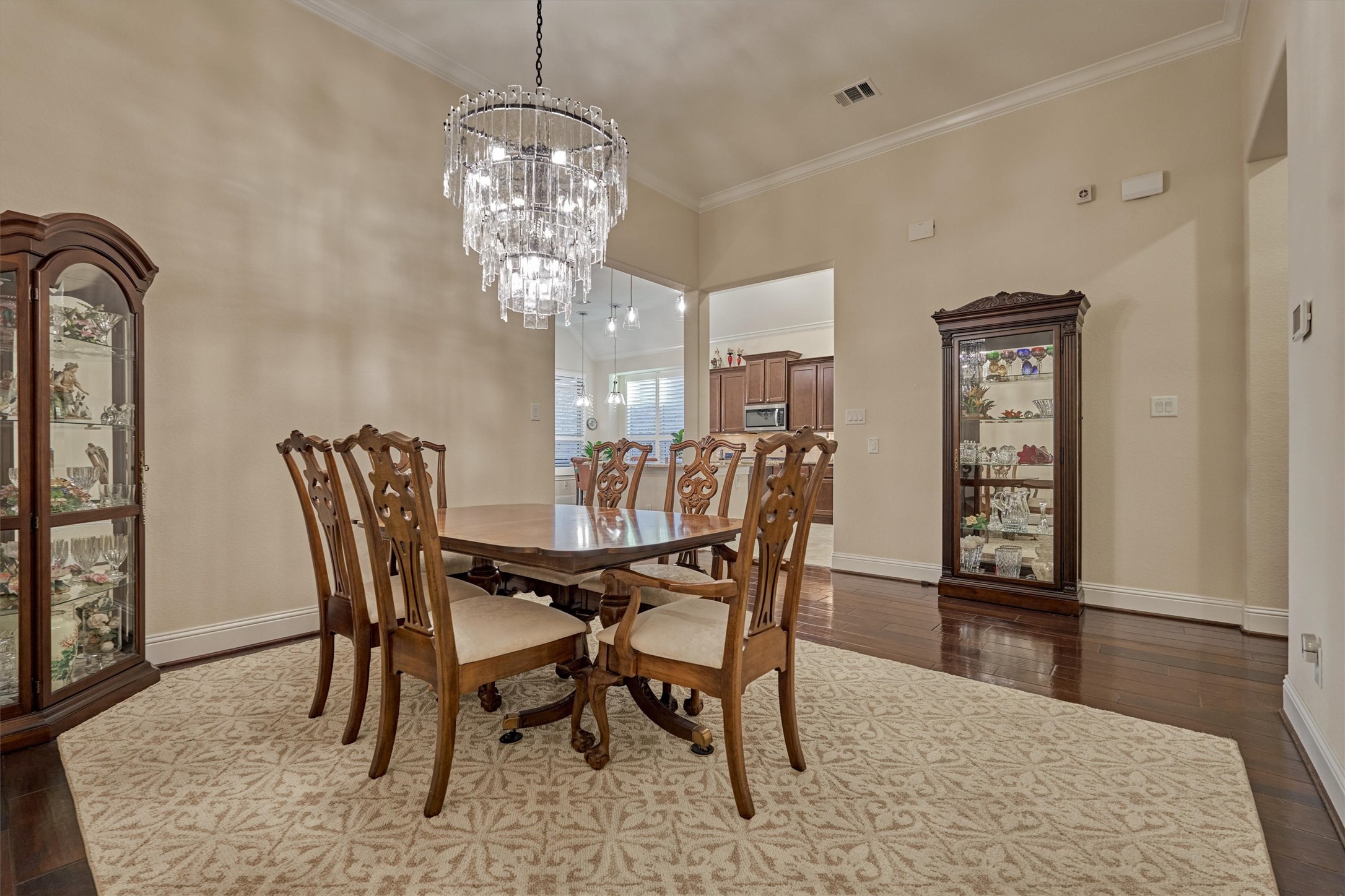 8827 Leaning Hollow Lane Spring, TX 77379 - Photo 19 of 49 Plentry of room for a sideboard and curio cabinets. Full view of kitchen and easy access for serving.