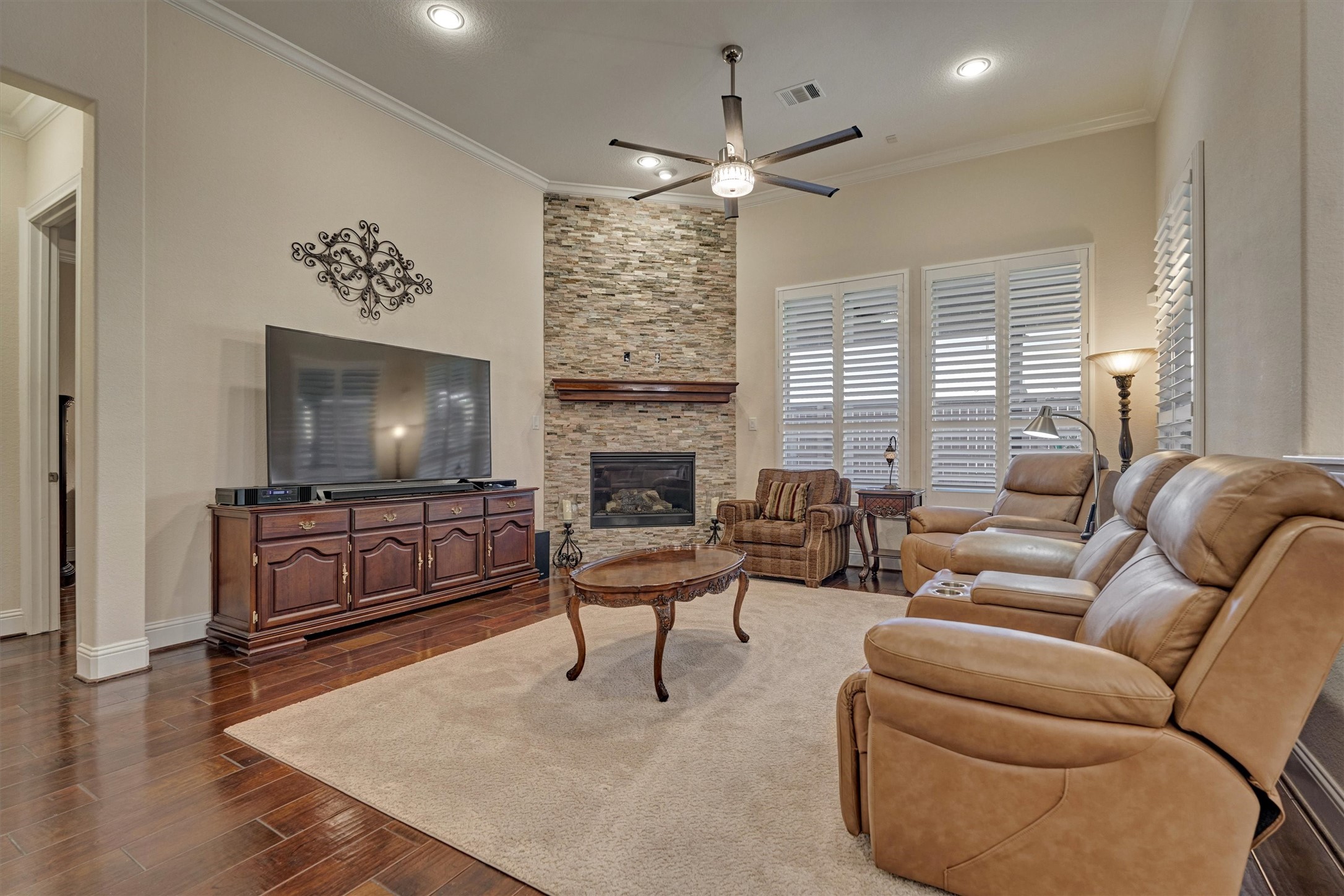 8827 Leaning Hollow Lane Spring, TX 77379 - Photo 28 of 49 Doesn't that beatiful recently remodeled stack stone fireplace! It also has the plus to have a tv or just cover it with a picture for style.