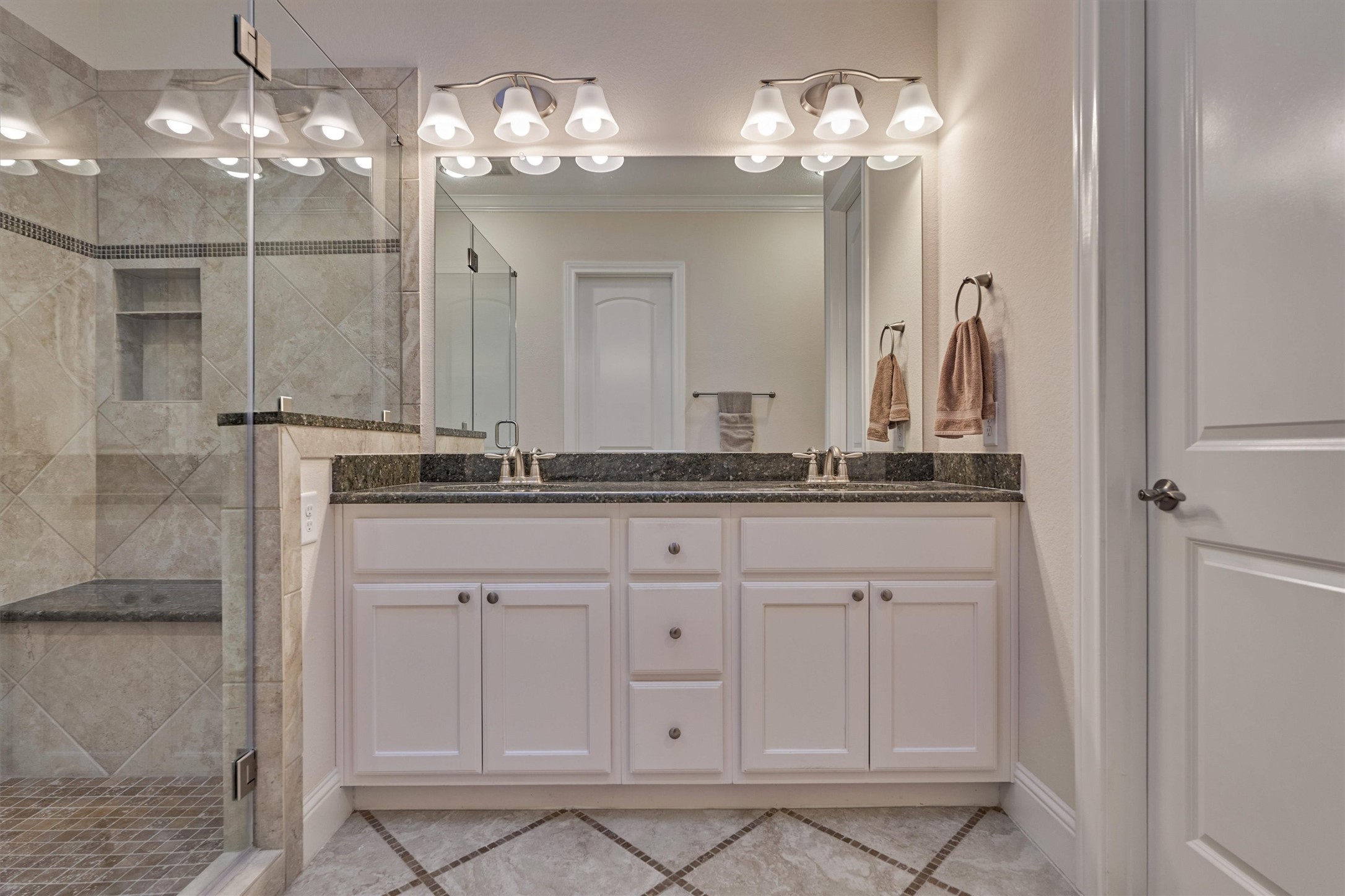 8827 Leaning Hollow Lane Spring, TX 77379 - Photo 35 of 49 Cabinet and drawer storage. Frameless shower door. Double closet systems.