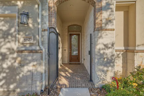 a front view of a house with a glass door