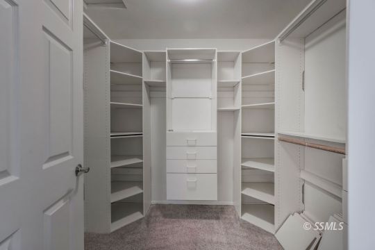 1257 Carolyn Street Ridgecrest, CA 93555 - Photo 32 of 42 a view of walk in closet with empty racks