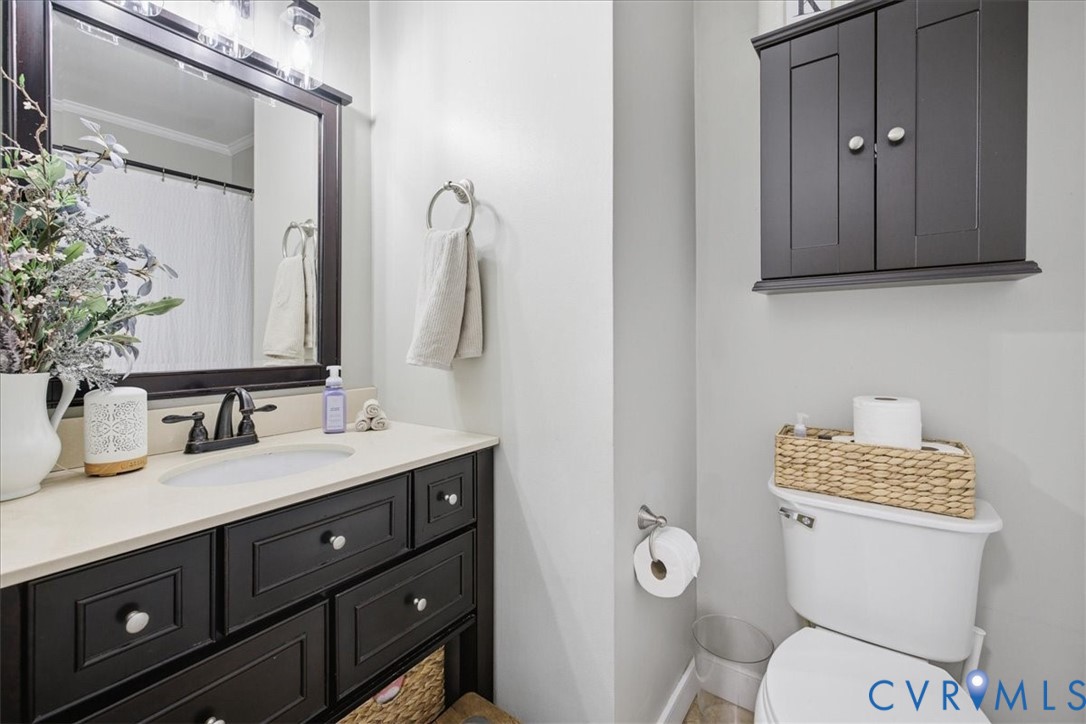 7900 Valencia Road Chesterfield, VA 23832 - Photo 19 of 37 Vanity with stone countertop, undermount sink, and