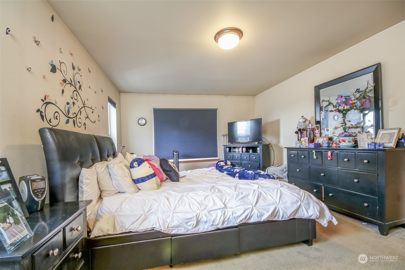 4644 Chanting Circle Southwest Port Orchard, WA 98367 - Photo 11 of 26 a bedroom with a bed and a lamp on dresser