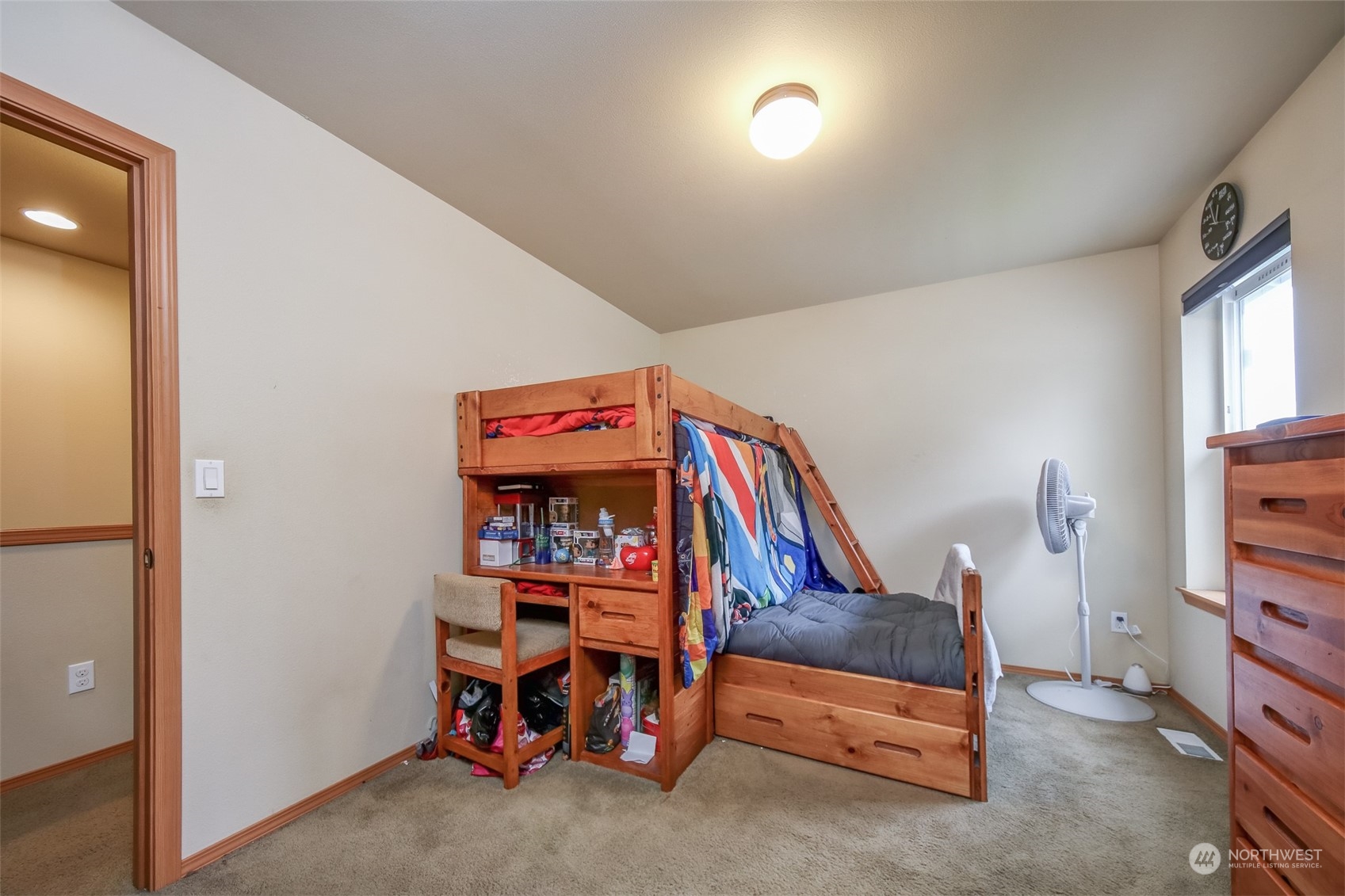 4644 Chanting Circle Southwest Port Orchard, WA 98367 - Photo 14 of 26 a bedroom with furniture and a lamp