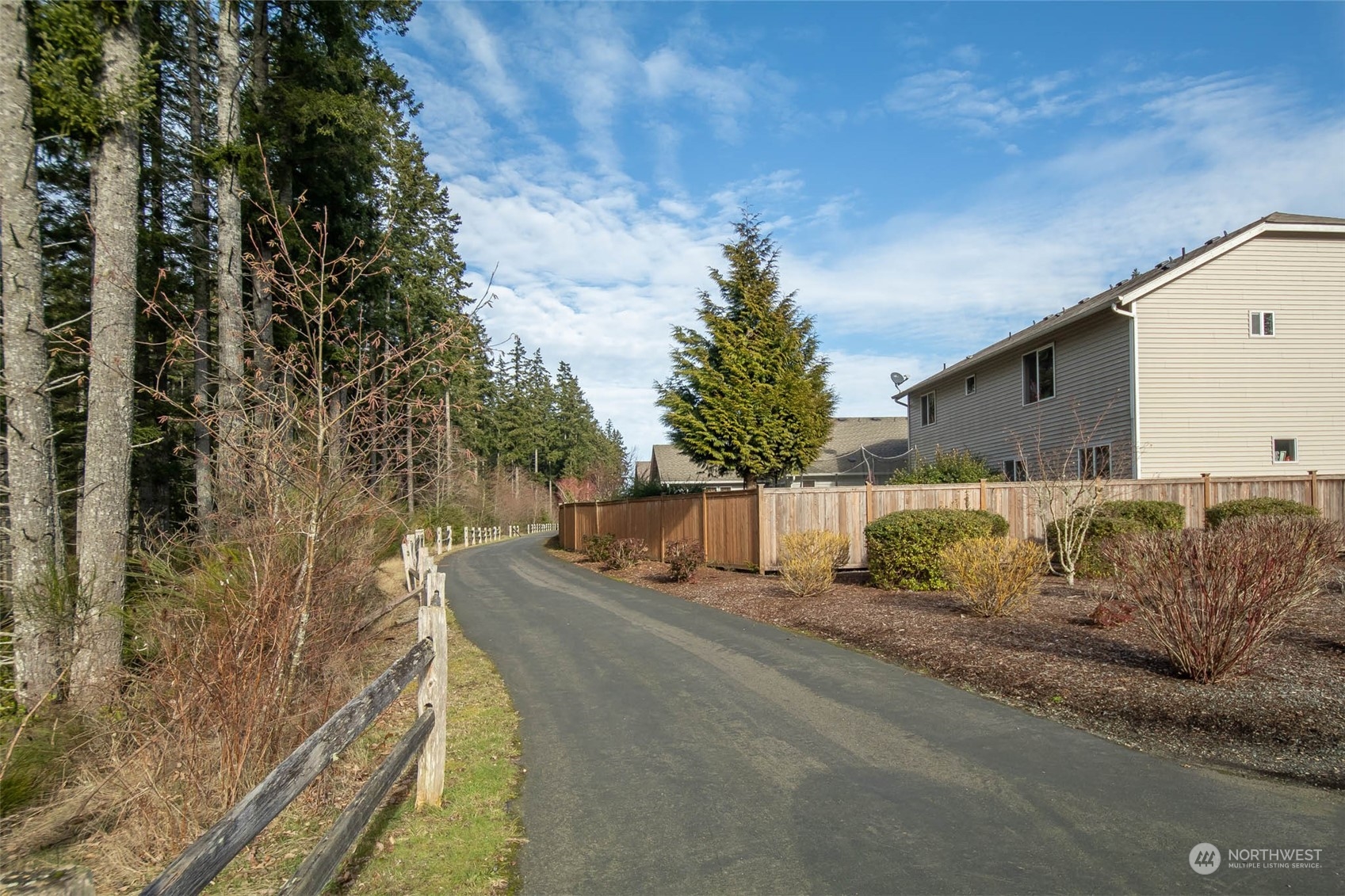 4644 Chanting Circle Southwest Port Orchard, WA 98367 - Photo 18 of 26 a view of a back yard of the house