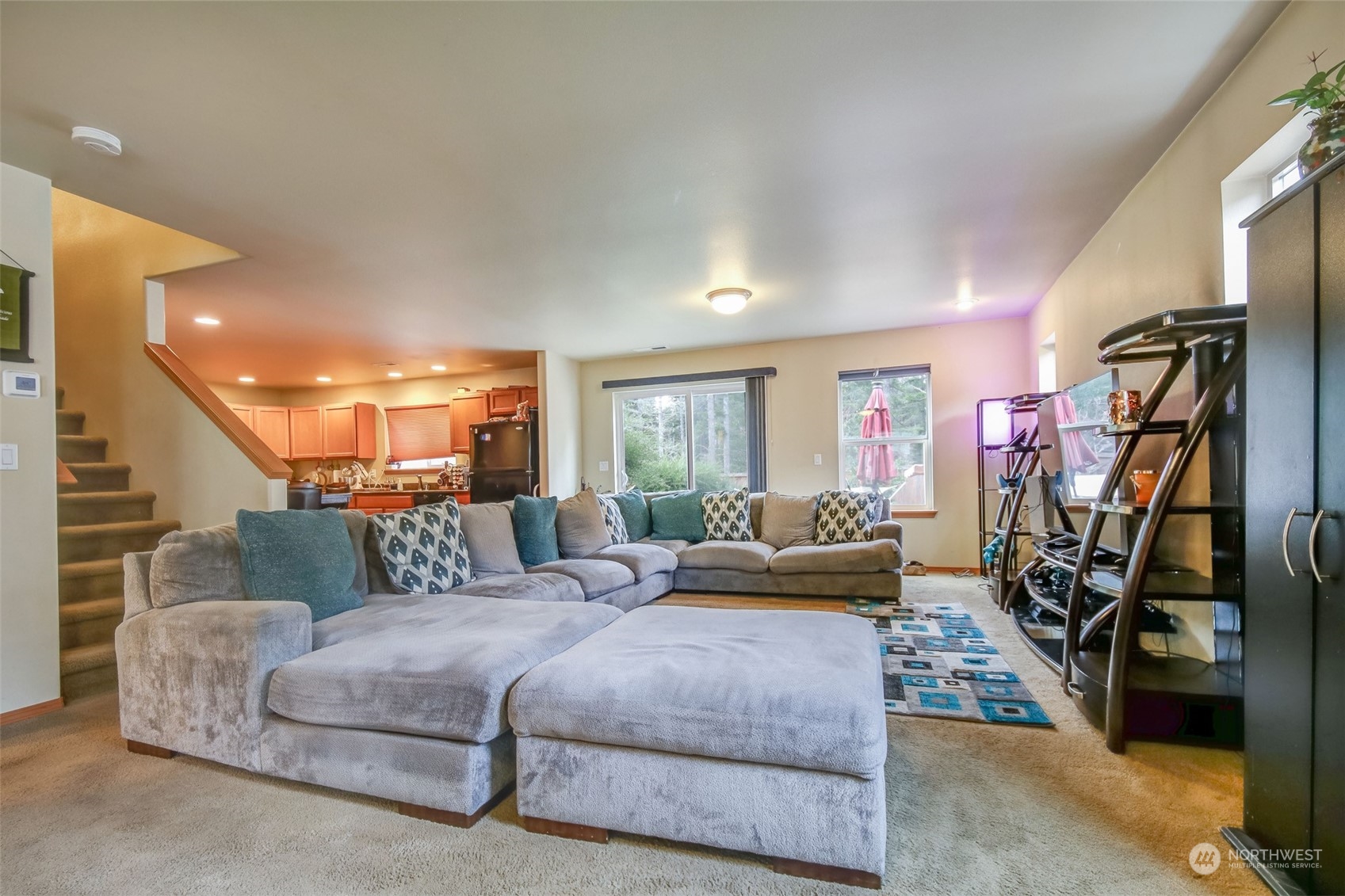 4644 Chanting Circle Southwest Port Orchard, WA 98367 - Photo 2 of 26 a bedroom with furniture or wooden floor and a window
