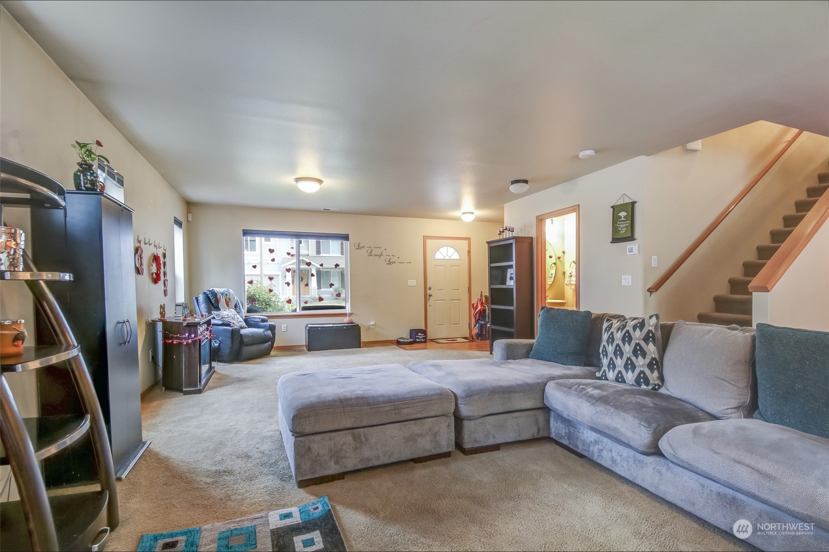 4644 Chanting Circle Southwest Port Orchard, WA 98367 - Photo 3 of 26 a living room with furniture and a flat screen tv