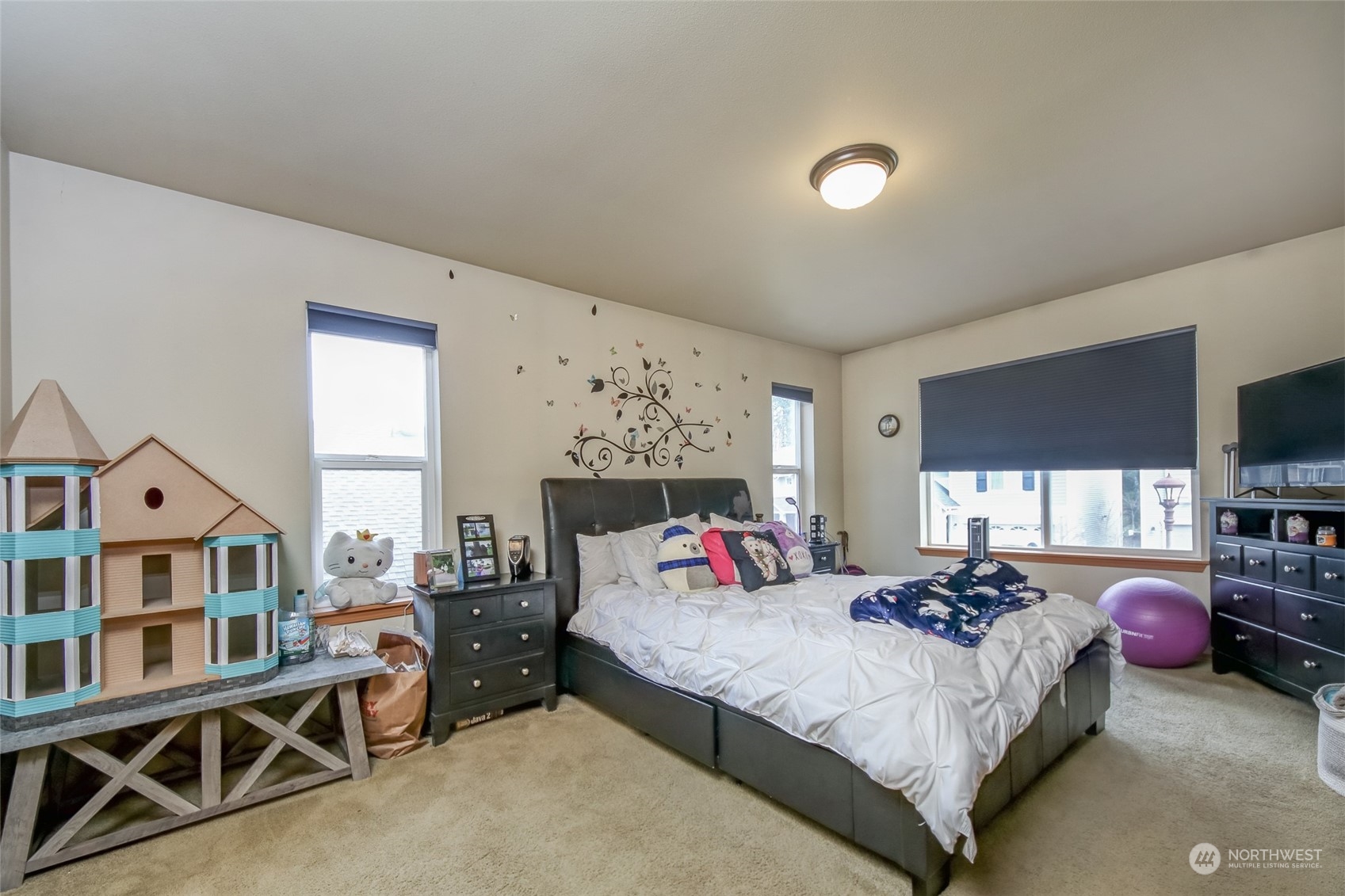 4644 Chanting Circle Southwest Port Orchard, WA 98367 - Photo 10 of 26 a bedroom with furniture window and flat screen tv