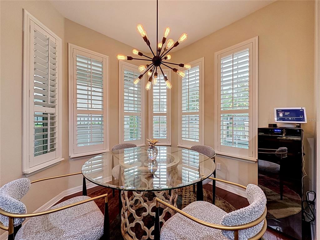 255 Silver Maple Road Groveland, FL 34736 - Photo 27 of 68 a dining room with furniture and window