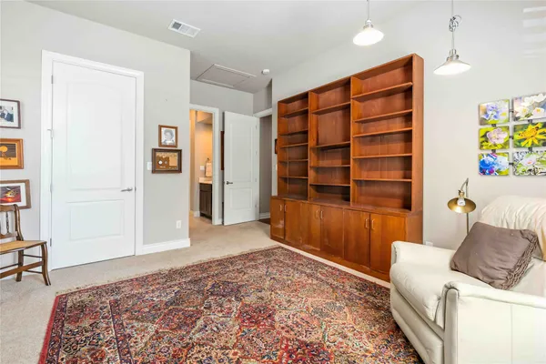 a bedroom with a bed and furniture
