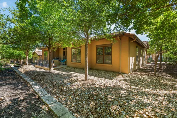 a house with trees in front of it