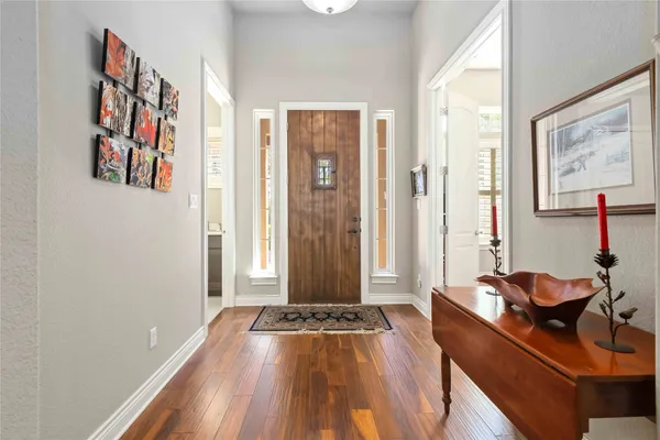 a living room with furniture and a gate