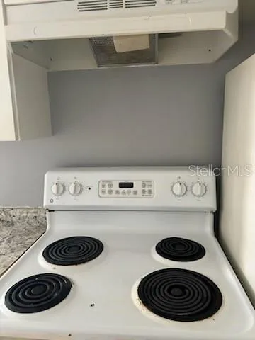 a close view of a stove top oven with a stove