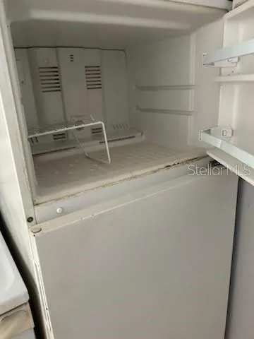 a utility room with cabinets