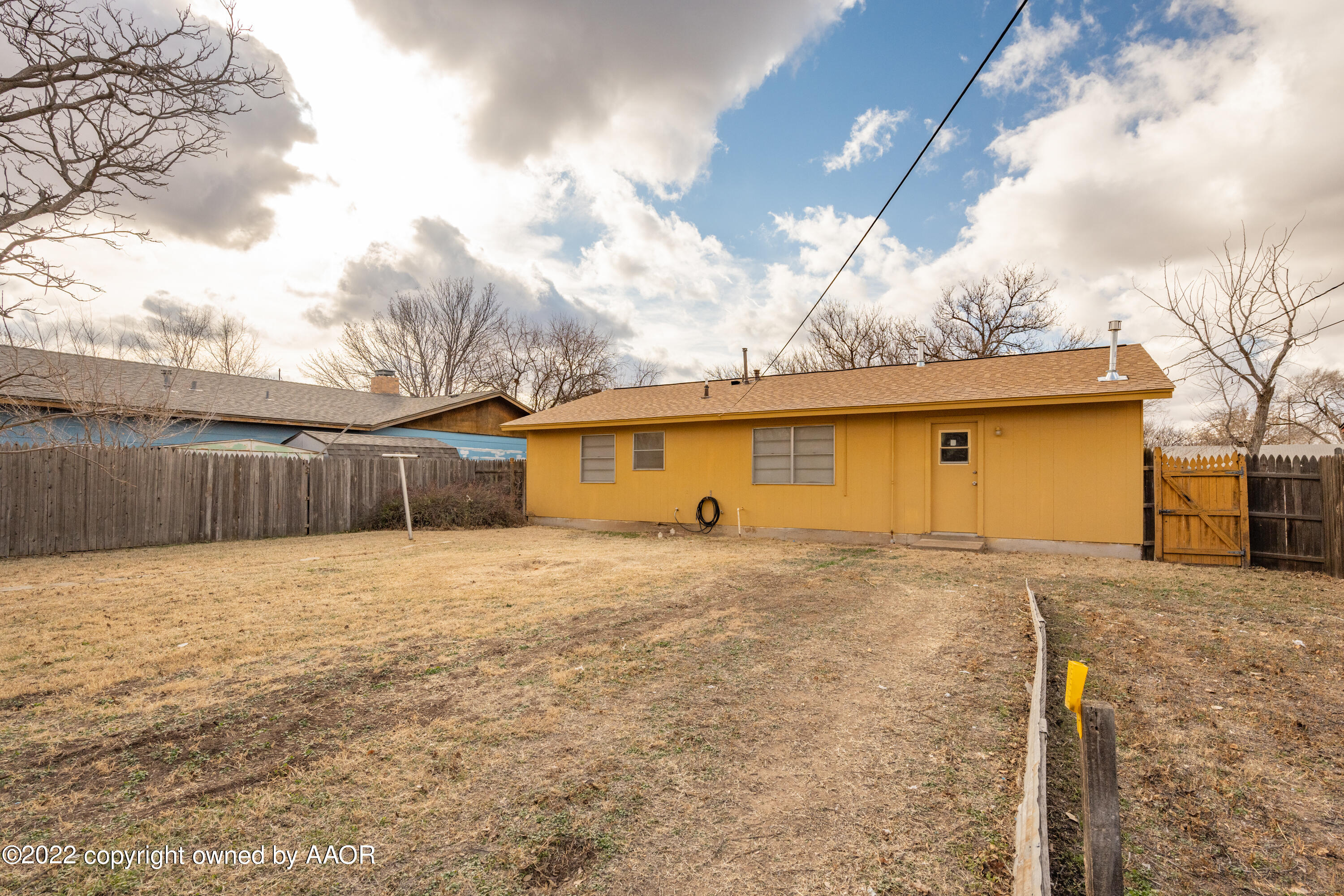 5311 Allen Street Amarillo, TX 79110 - Photo 21 of 22 a front view of house with yard and trees