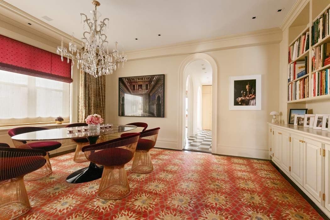 29 East 64th Street, Unit 4C Manhattan, NY 10065 - Photo 3 of 9 a living room with furniture chandelier and a window